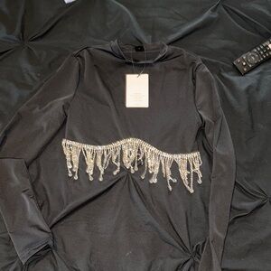 Elegant Black Top with Silver Embellishments